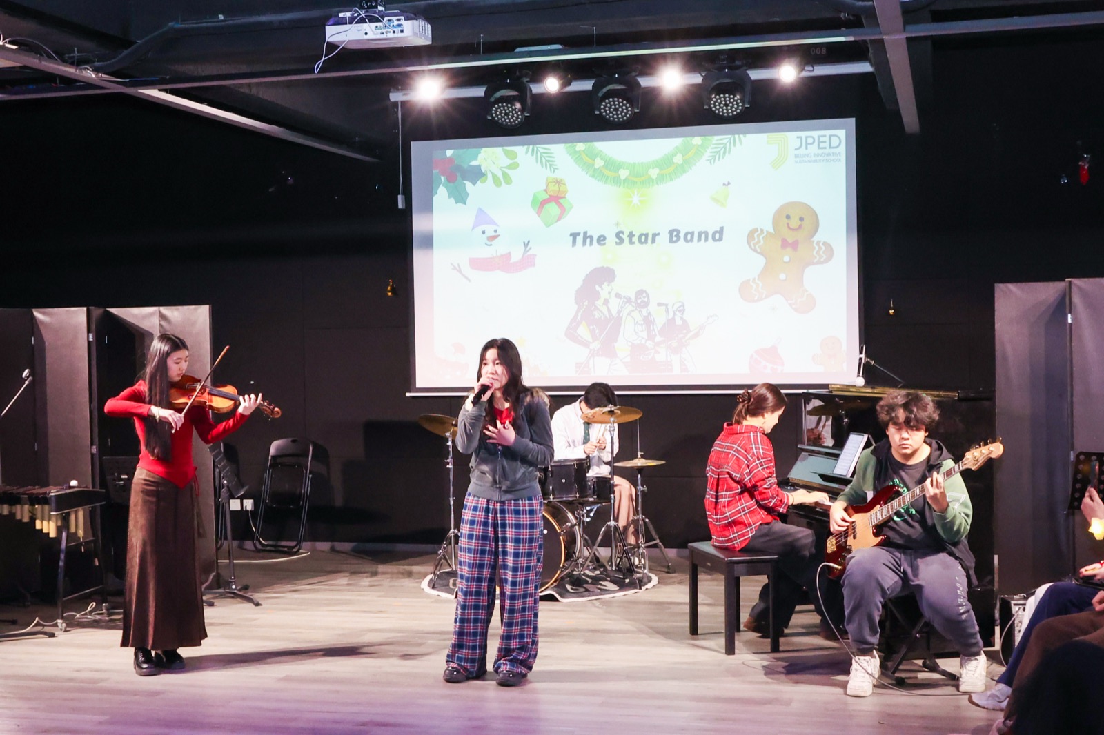 Apprisica performing at a school event