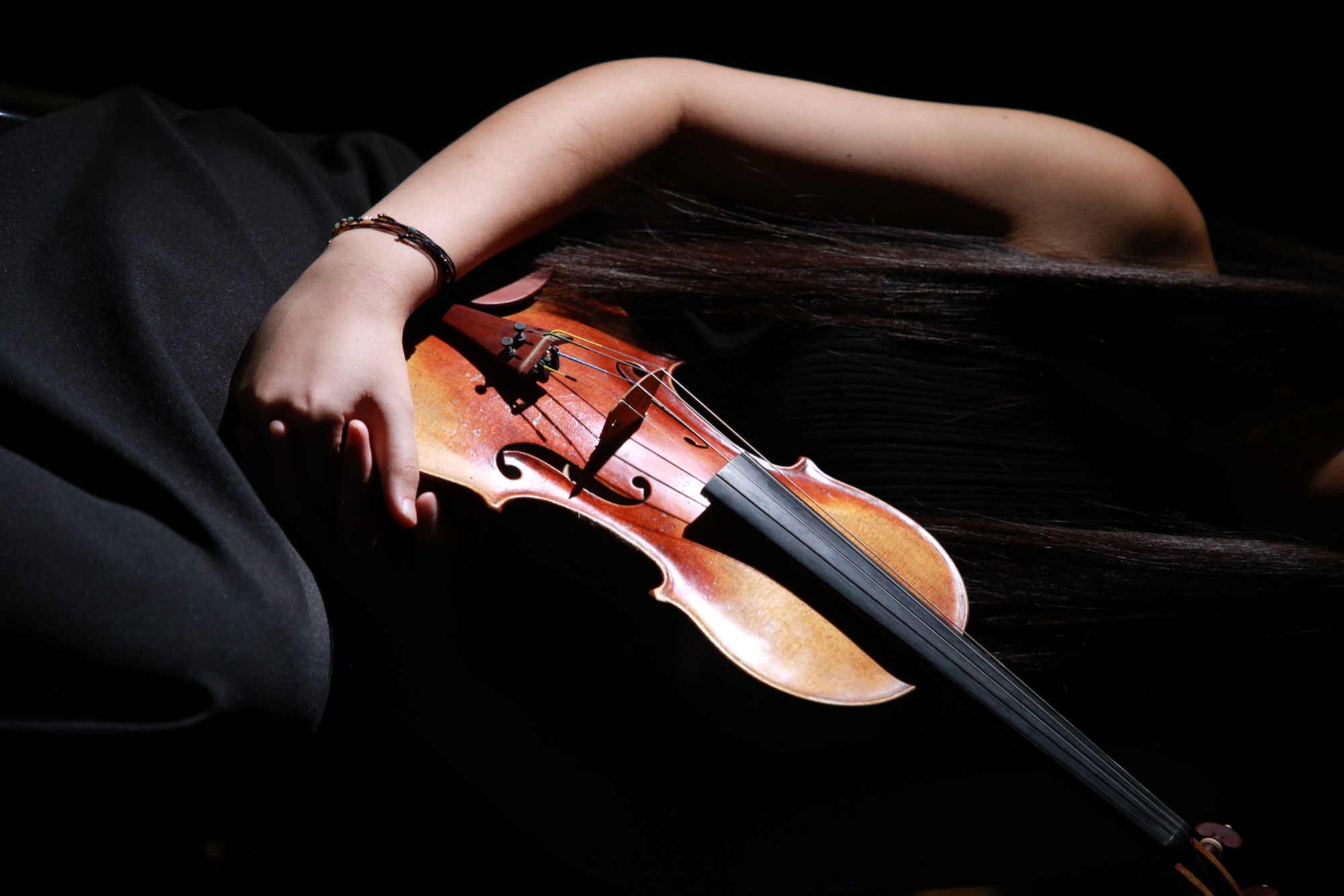 The Violin III. She embraces it, and it becomes part of her.